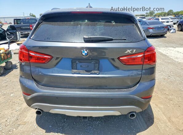 WBXHT3C36GP884581 2016 BMW X1 Gray Vista trasera