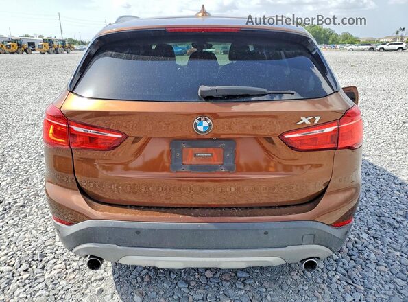 WBXHT3C36GP885519 2016 BMW X1 Tan Rear view