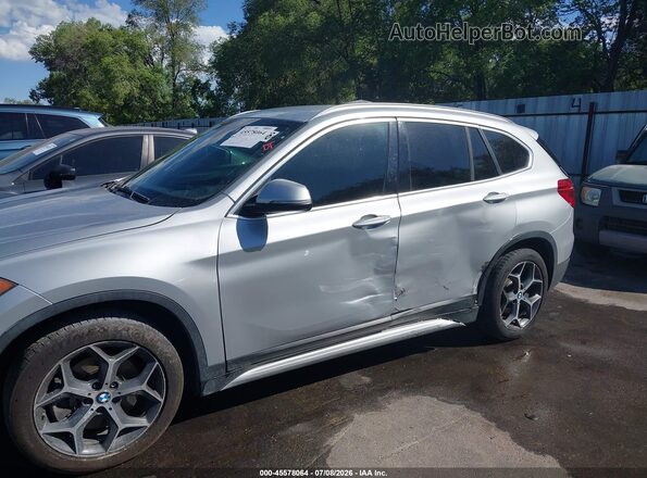 WBXHT3C36GP889652 2016 BMW X1 Silver Front view