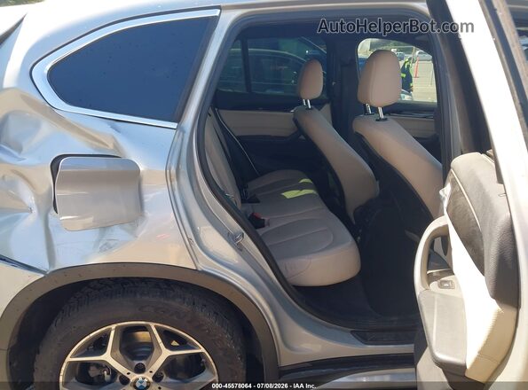 WBXHT3C36GP889652 2016 BMW X1 Silver VIN sticker view