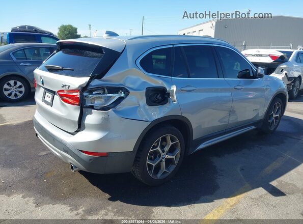 WBXHT3C36GP889652 2016 BMW X1 Silver Rear right