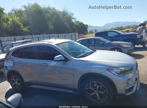 WBXHT3C36GP889652 2016 BMW X1 Silver Rear interior view