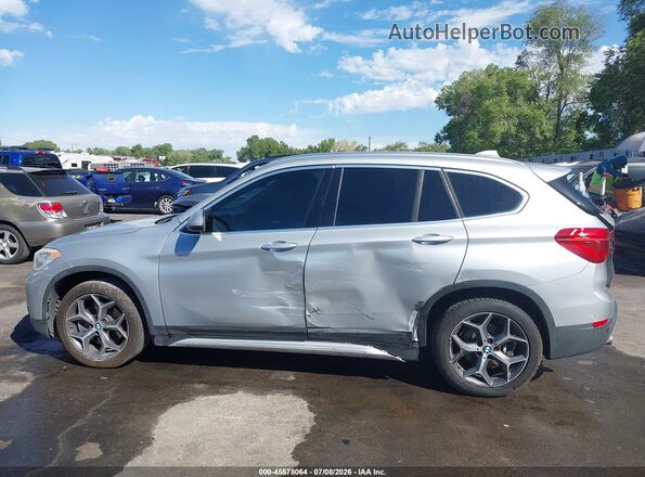 WBXHT3C36GP889652 2016 BMW X1 Silver 360 interior view