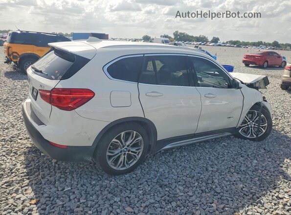 WBXHT3C36H5F73989 2017 BMW X1 White Rear right