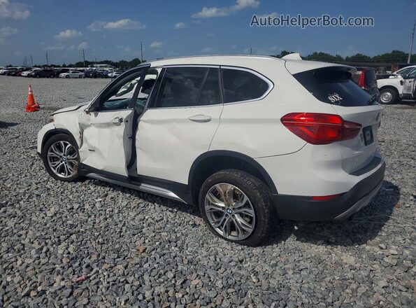 WBXHT3C36H5F73989 2017 BMW X1 White Rear left
