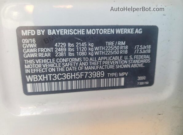 WBXHT3C36H5F73989 2017 BMW X1 White VIN sticker view