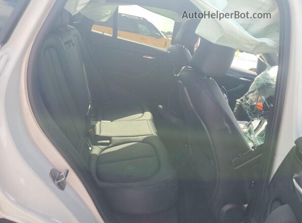 WBXHT3C36H5F73989 2017 BMW X1 White Rear interior view