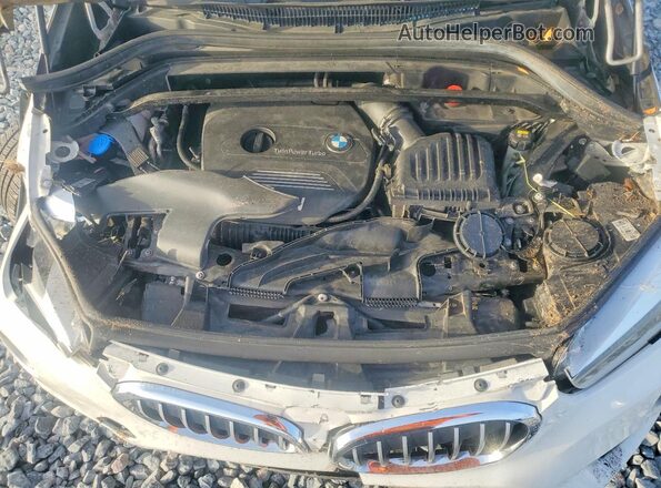 WBXHT3C36H5F73989 2017 BMW X1 White Engine compartment view