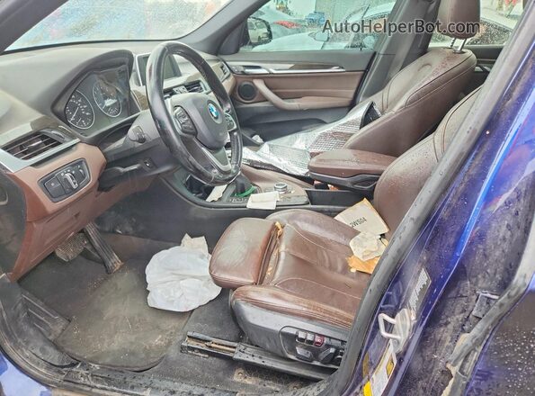 WBXHT3C36H5F85110 2017 BMW X1 Blue წინა სალონის ხედი