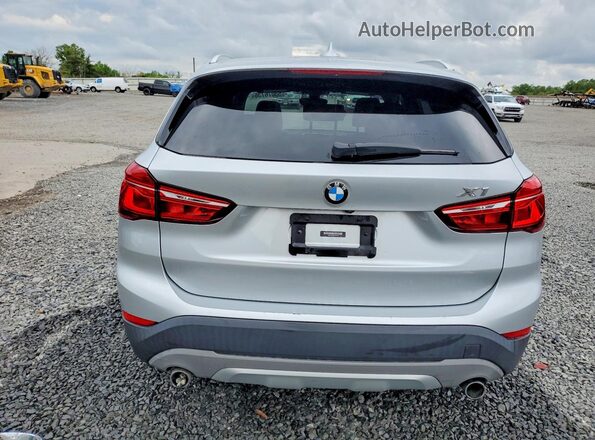 WBXHT3C36J5F93195 2018 BMW X1 Silver Հետևի տեսք
