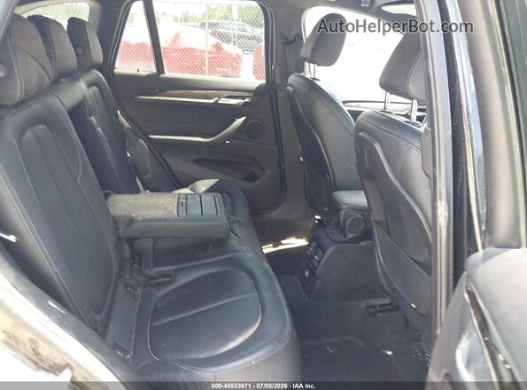 WBXHT3C36J5K23071 2018 BMW X1 Black Вид наклейки з VIN-кодом