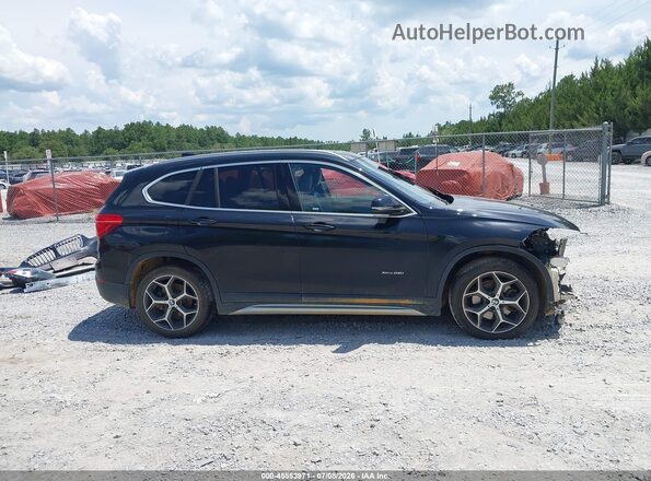 WBXHT3C36J5K23071 2018 BMW X1 Black Вид задньої частини салону
