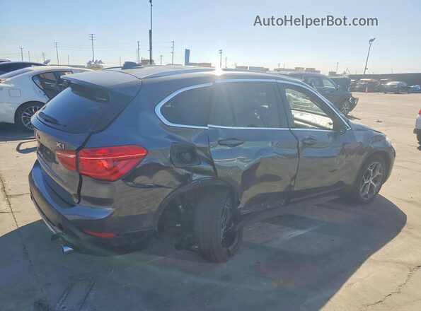 WBXHT3C36J5K31137 2018 BMW X1 Black Tył prawy