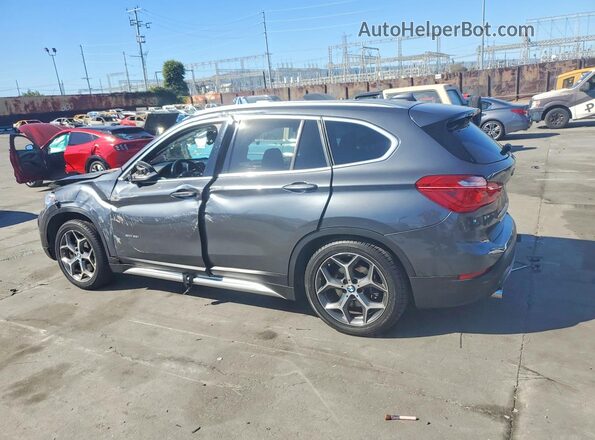 WBXHT3C36J5K31137 2018 BMW X1 Black Tył lewy