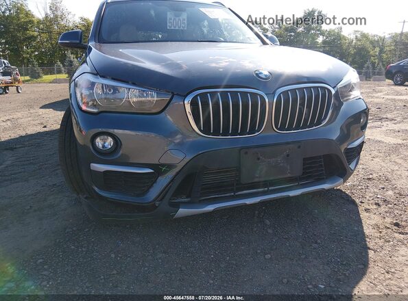 WBXHT3C36J5L34705 2018 BMW X1 Gray Widok z przodu