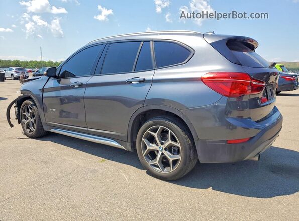 WBXHT3C37G5F64099 2016 BMW X1 Gray Trasero izquierdo