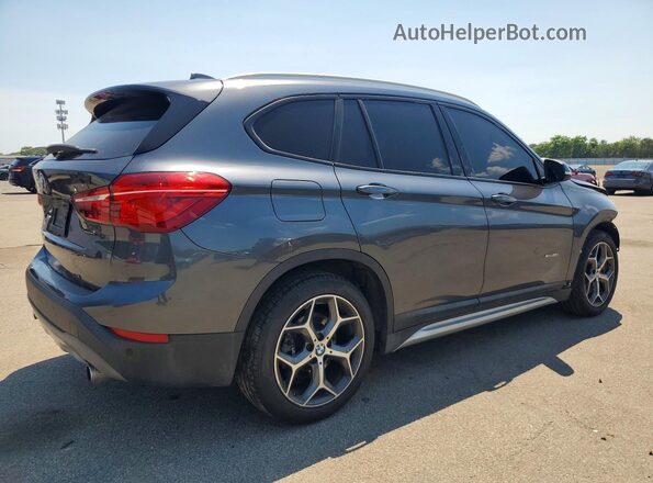 WBXHT3C37G5F64099 2016 BMW X1 Gray Trasero derecho