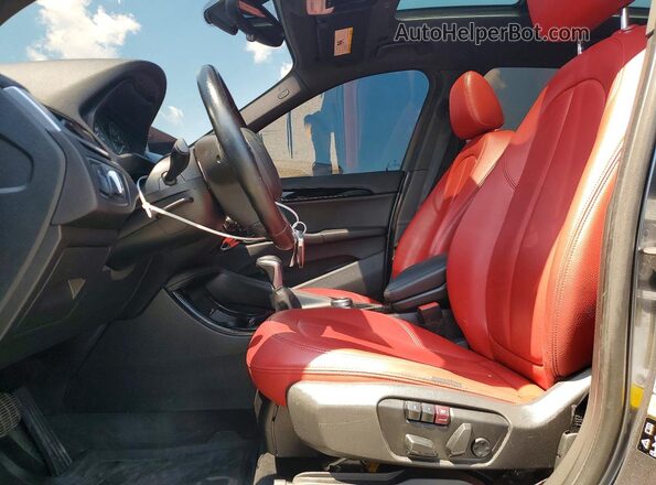 WBXHT3C37G5F64099 2016 BMW X1 Gray Vista interior delantera