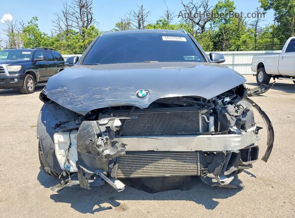 WBXHT3C37G5F64099 2016 BMW X1 Gray Vista frontal