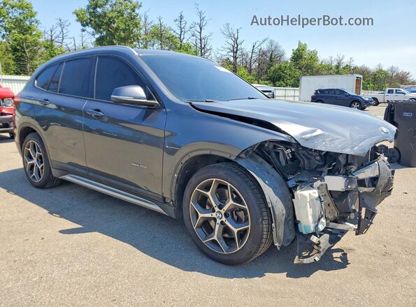 WBXHT3C37G5F64099 2016 BMW X1 Gray Delantero derecho