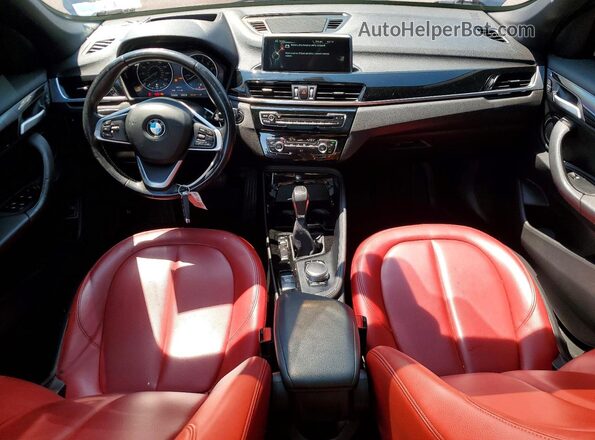 WBXHT3C37G5F64099 2016 BMW X1 Gray Vista del salpicadero