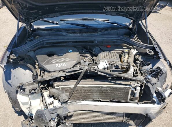 WBXHT3C37G5F64099 2016 BMW X1 Gray Vista del compartimento del motor