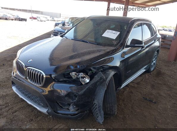 WBXHT3C37GP886419 2016 BMW X1 Black Front left