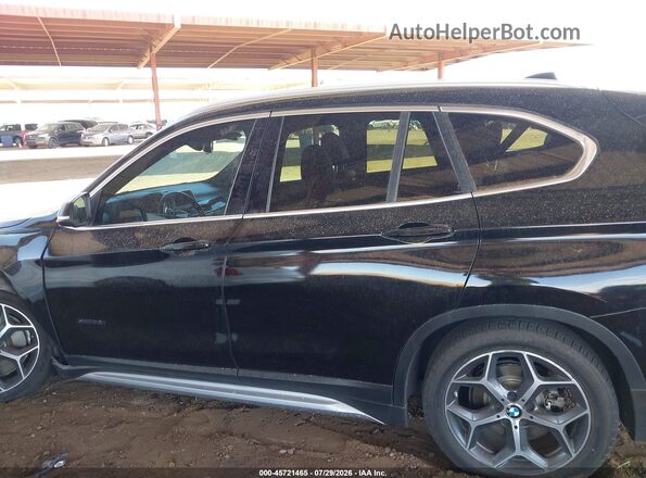 WBXHT3C37GP886419 2016 BMW X1 Black Rear interior view