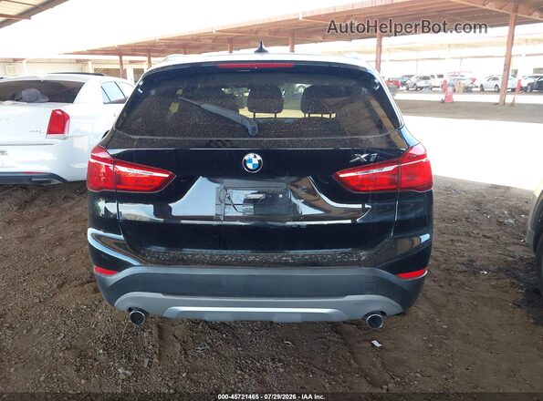 WBXHT3C37GP886419 2016 BMW X1 Black 