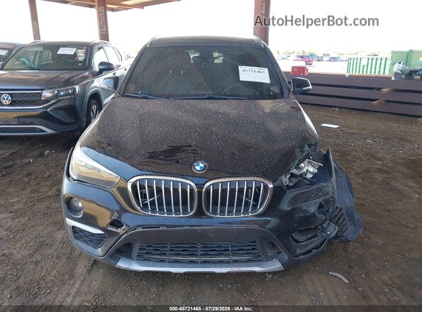 WBXHT3C37GP886419 2016 BMW X1 Black Dashboard view