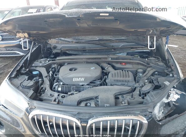 WBXHT3C37GP886419 2016 BMW X1 Black Rear view
