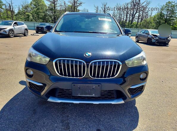WBXHT3C37J5F89916 2018 BMW X1 Black Դիմացի տեսք