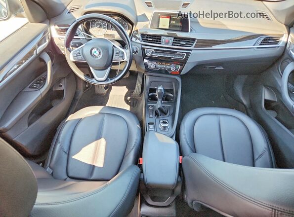 WBXHT3C37J5F89916 2018 BMW X1 Black Առջևի վահանակի տեսք