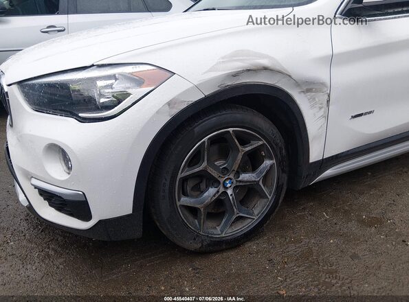 WBXHT3C37J5F92332 2018 BMW X1 White Vista frontal