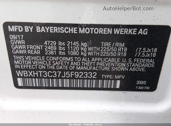 WBXHT3C37J5F92332 2018 BMW X1 White Vista del compartimento del motor