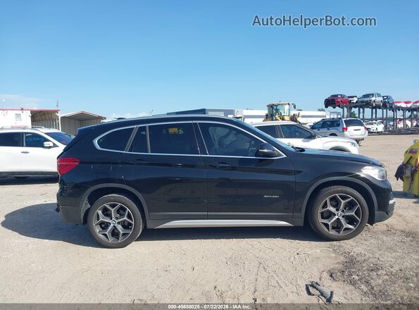 WBXHT3C37J5L24782 2018 BMW X1 White Вид задньої частини салону