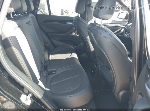 WBXHT3C37J5L24782 2018 BMW X1 White Вид наклейки з VIN-кодом
