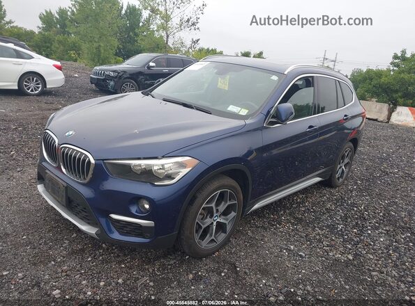WBXHT3C37J5L33725 2018 BMW X1 Синий Передняя левая четверть