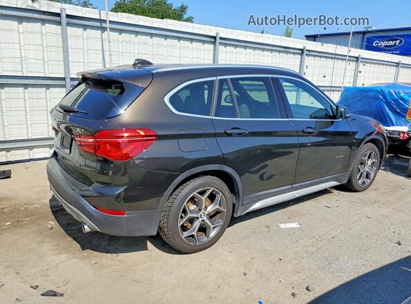 WBXHT3C38G5E51262 2016 BMW X1 Black Rear right