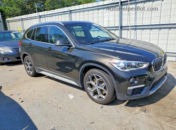 WBXHT3C38G5E51262 2016 BMW X1 Black Front right