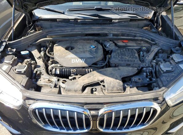 WBXHT3C38G5E51262 2016 BMW X1 Black Engine compartment view