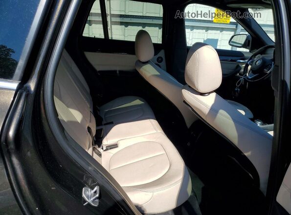 WBXHT3C38G5E51262 2016 BMW X1 Black Rear interior view