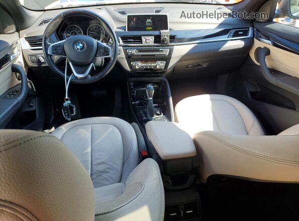 WBXHT3C38G5E51262 2016 BMW X1 Black Dashboard view