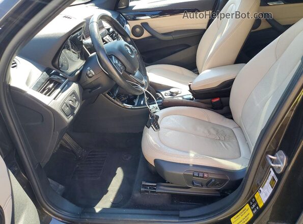 WBXHT3C38G5E51262 2016 BMW X1 Black Front interior view