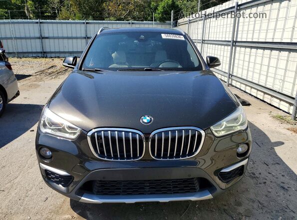WBXHT3C38G5E51262 2016 BMW X1 Black Front view