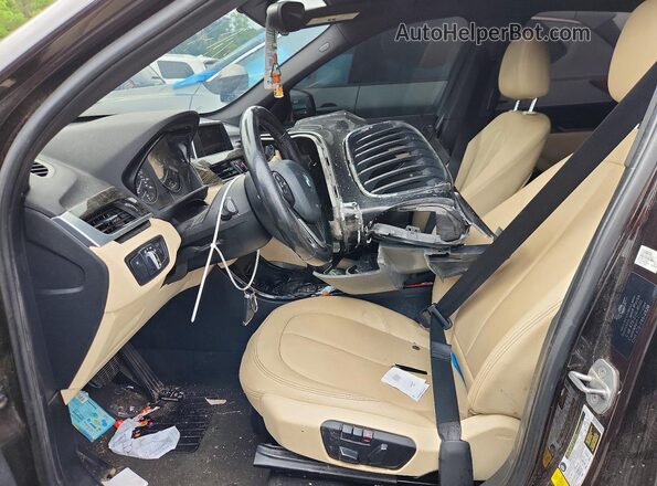 WBXHT3C38G5E55442 2016 BMW X1 Black წინა სალონის ხედი