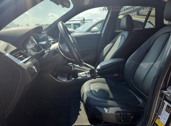 WBXHT3C38GP887076 2016 BMW X1 Gray Widok wnętrza z przodu