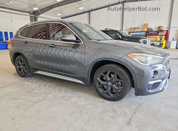 WBXHT3C38GP887076 2016 BMW X1 Gray Przód prawy