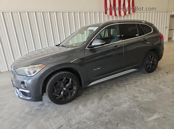 WBXHT3C38GP887076 2016 BMW X1 Gray Widok wnętrza 360 stopni
