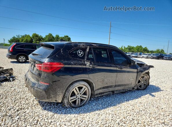 WBXHT3C38H5F79776 2017 BMW X1 Black Tył prawy